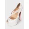 White snakeskin shoes