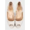 White snakeskin shoes
