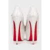 White snakeskin shoes