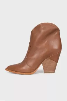 Brown pointed-toe Cossack boots