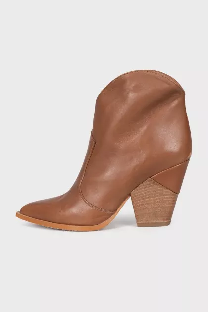 Brown pointed-toe Cossack boots