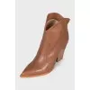 Brown pointed-toe Cossack boots
