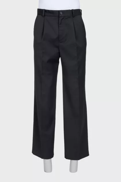 Men's black trousers with creases