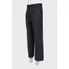 Men's black trousers with creases