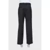 Men's black trousers with creases