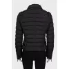 Fitted jacket with diagonal fastening