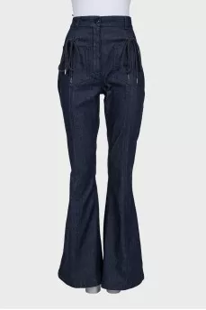 Flared jeans decorated with lacing