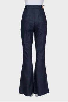 Flared jeans decorated with lacing
