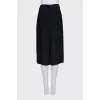 Black pleated culottes