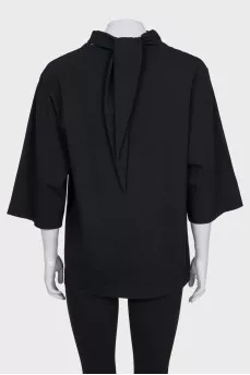 Black T-shirt with ties at the collar