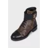 Leather boots in the signature Wonderland print
