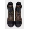 Leather boots in the signature Wonderland print