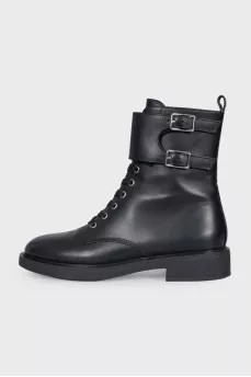 Black leather boots with straps