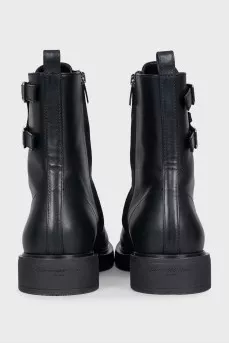 Black leather boots with straps