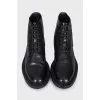 Black boots with perforations