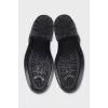 Black boots with perforations