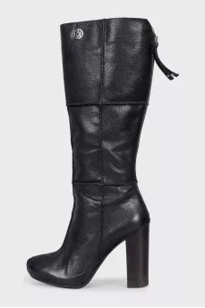 Black leather boots with a zipper