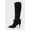 Black suede boots with a bow