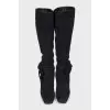 Black suede boots with a bow