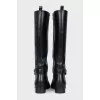 Leather boots with silver pendant