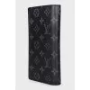 Men's wallet with a signature monogram