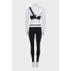 A tracksuit consisting of two tops and leggings