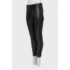Black eco-leather trousers with stripes