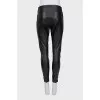 Black eco-leather trousers with stripes