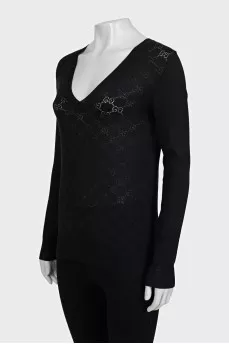 Black pullover with signature monogram
