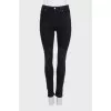 Black mid-rise skinny jeans