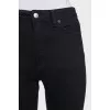 Black mid-rise skinny jeans