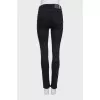 Black mid-rise skinny jeans