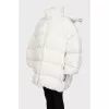 Білий пуховик фасону oversize