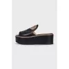 Leather flip-flops with a gold logo