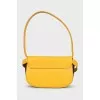 Leather bag with metal logo