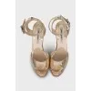 Gold high heel sandals