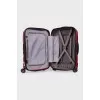 Red suitcase with a relief pattern