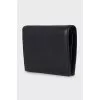 Black leather wallet with gold logo