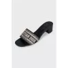 Textile mules with a brand logo