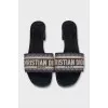 Textile mules with a brand logo