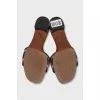 Textile mules with a brand logo
