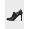 Black shoes with metallic decor