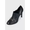 Black shoes with metallic decor