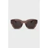 Sunglasses with transparent frames and logo