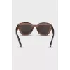 Sunglasses with transparent frames and logo