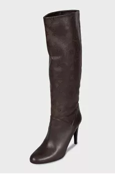 Leather boots with perforated heels