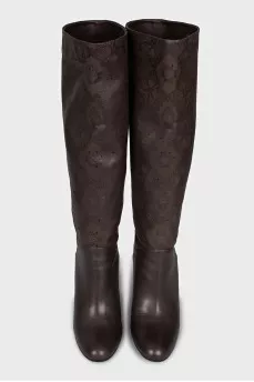 Leather boots with perforated heels