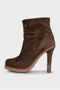 Brown suede ankle boots with a zipper