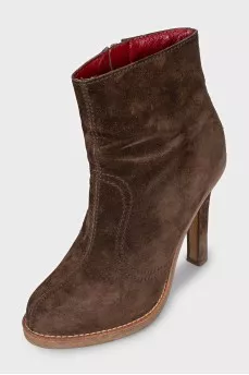 Brown suede ankle boots with a zipper
