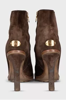 Brown suede ankle boots with a zipper